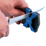 Knife being sharpened through AccuSharp SharpNEasy 2-Step Ceramic Stone Sharpener Knife being sharpened through AccuSharp SharpNEasy 2-Step Ceramic Stone Sharpener