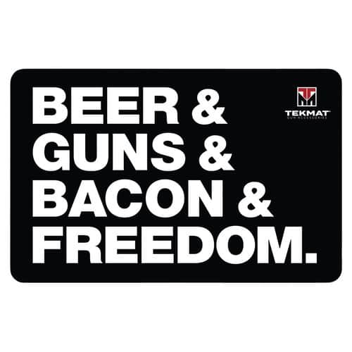 TekMat "Beer & Guns & Bacon & Freedom" Original Mat Black/White Rubber 17" Long 11" x 17" Illustration TekMat "Beer & Guns & Bacon & Freedom" Original Mat Black/White Rubber 17" Long 11" x 17" Illustration